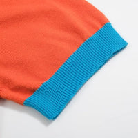 
              OXKNIT Retro Knitted Polo Shirts for Men, 1960s Geometric Pattern Short Sleeve with Quarter Button, Orange Blue
            